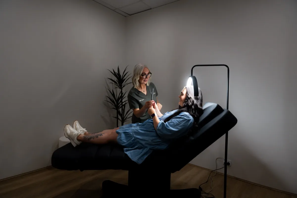 NuVive Cosmetics treatment room with client consultation